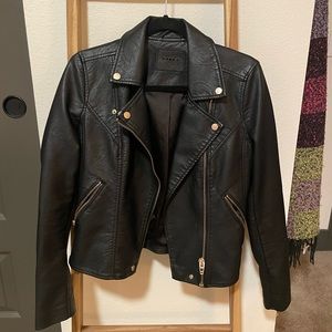 Black faux leather jacket with gold hardware